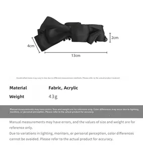 Detail view of large black satin bow banana hair clip with size and weight specs