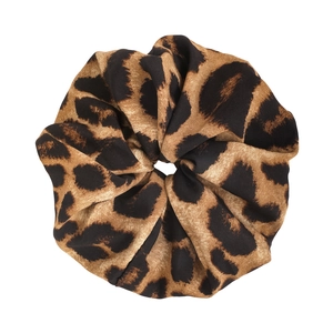 Stylish leopard print scrunchie for women with classic pattern and soft fabric texture