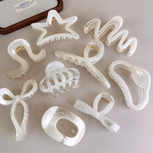 Set de 9 pinces à cheveux en acétate blanc gélifié avec texture marbre et styles variés