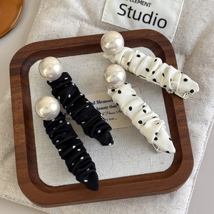 French retro style polka dot hair clips set with pearls and ruched fabric texture
