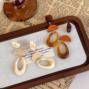 Retro resin geometric drop earrings in warm earth tones with a vintage bohemian style