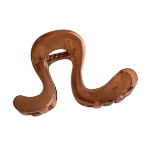 Brown translucent wave-shaped hair claw clip with glossy resin finish for women
