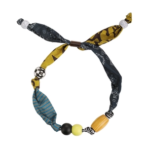 Handmade fabric patchwork necklace with colorful beads and artistic Bohemian style pattern