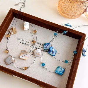 Double-layered beach style shell necklace with blue and champagne beads for women