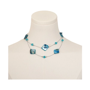 Double-layered beach vacation necklace with irregular blue shell pendants and clear beads