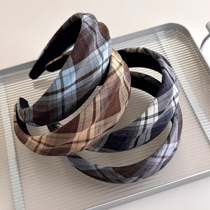 Three vintage plaid fabric wide headbands in blue, coffee, and black patterns
