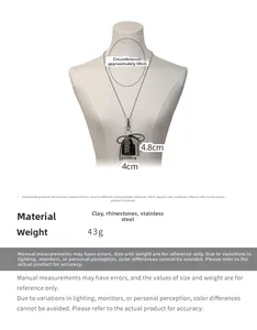 Detail view of sparkly handbag pendant necklace with size dimensions and material info