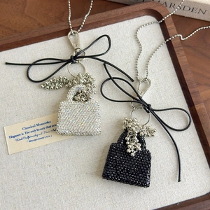 Luxury sparkling rhinestone bag pendant necklace with silver beads and black ribbon bow