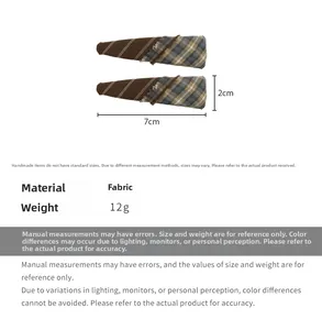 Detail showing 7x2cm size dimensions for plaid fringe and brown fabric hair clips