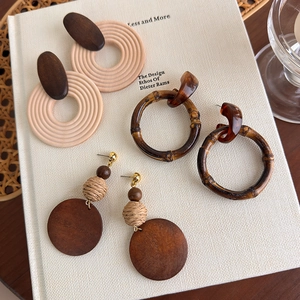 Bohemian geometric wooden earring set with cream and brown natural materials for women