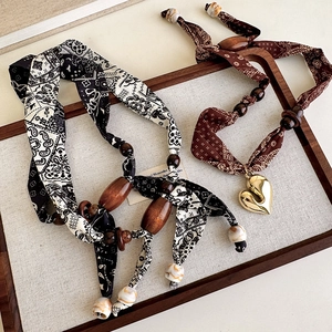 Vintage paisley fabric scarf necklaces with wooden beads and a gold heart pendant