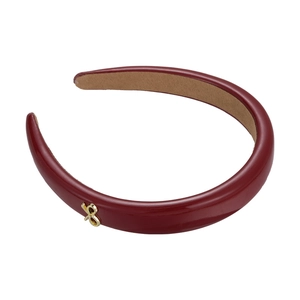 Retro wine red PU leather sponge headband with gold metal logo and non-slip lining