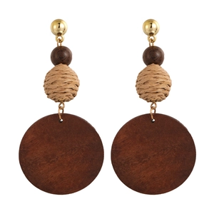 Bohemian geometric long earrings with gold metal, wood beads and beige woven straw ball