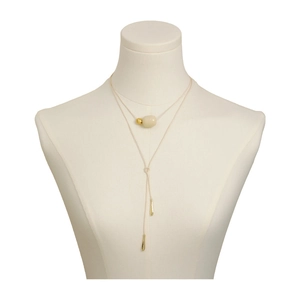 Minimalist double-layered necklace with cream bead and golden water drop pendants