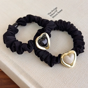 French style black fabric scrunchies set with heart pearl charms for elegant ponytails