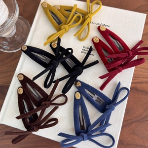 Set of retro velvet bow hair clips with gold metal plates in five classic deep colors