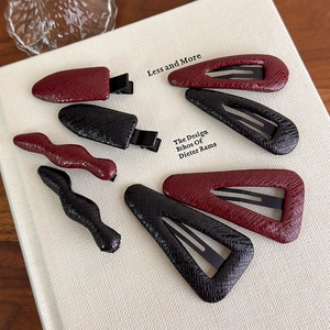 Retro red faux leather hair clip set with crocodile texture and geometric shapes