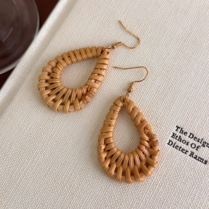 Bohemian handmade rattan teardrop earrings with golden hooks for a vintage ethnic style