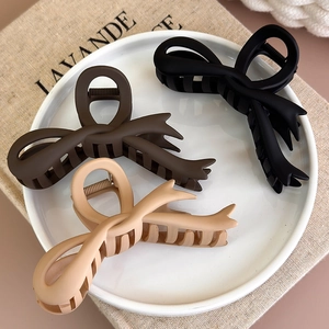 3er-Set matte Haarklammern mit Schleife in Schwarz, Braun und Beige für elegante Frisuren