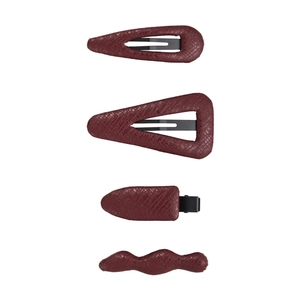 Set of four vintage deep red leather hair clips with geometric snakeskin textures