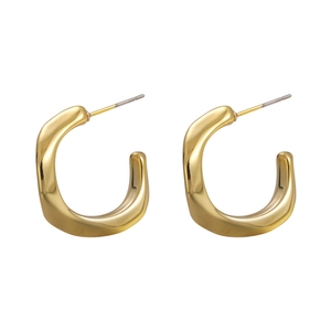 Polished golden irregular wave hoop earrings with a minimalist geometric twisted design