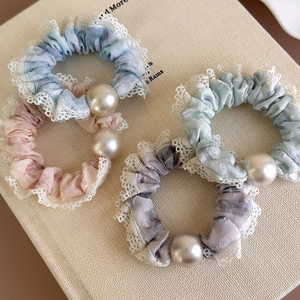 Set of four French style tie-dye fabric hair scrunchies with lace trim and large pearls