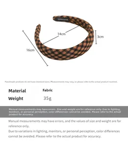 Detailed view of brown checkered fabric headband with handmade label and 3cm thick padding
