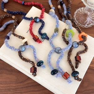Vintage hand-knitted beaded sweater necklace with colorful floral resin pendants