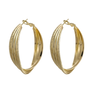 Three-layer twisted gold hoop earrings with matte and polished texture finishes