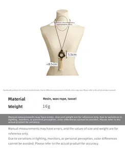 Detail view of wood shell flower pendant necklace with dimensions 8.5cm and 90cm rope
