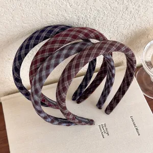 Retro plaid headband set in classic tartan patterns for a stylish preppy look