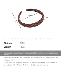 Detail showing dimensions and 22g weight of red plaid fabric headband with handmade tag