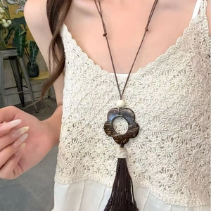 Retro hollow flower wood pendant necklace with long tassels and brown wax cord