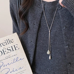 Silver adjustable Y-shaped sweater necklace with tiger eye and metal teardrop pendants