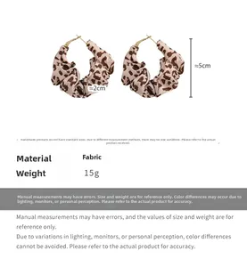 Detailed size and material specification chart for leopard print fabric hoop earrings