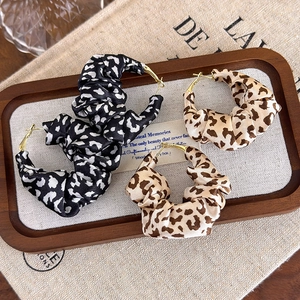 French retro oversized hoop earrings with leopard and dalmatian print fabric wrap