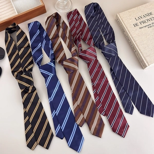 Five assorted stylish striped ties in various colors for preppy and business outfits