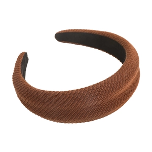 Brown knitted thick headband with textured cotton blend fabric for a classic autumn look