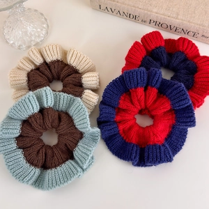 Oversized knitted contrast color scrunchies for hair ties in soft vintage style