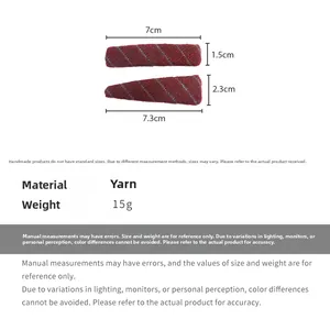 Detailed size chart showing red striped knit hair clips measuring 7cm and 7.3cm in length