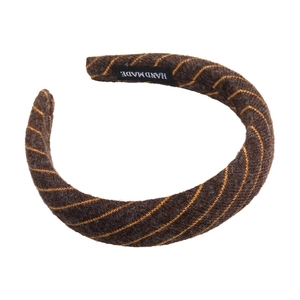 Elegant brown and yellow striped padded headband with a handmade label for women