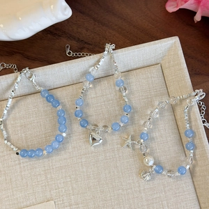 Bracelet perles étoile de mer cœur en verre bleu et argent style océanique
