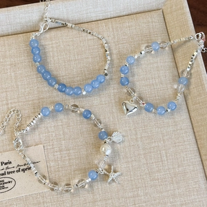 Ensemble de bracelets en perles bleues avec breloques en forme d'étoile de mer et cœur