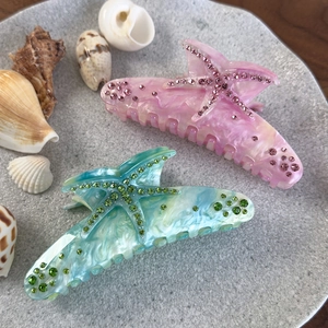 Pinces à cheveux étoile de mer colorées avec texture marbre et strass pour femmes