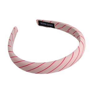 Chic ballet pink headband with red diagonal stripes and sponge padding for high skull top