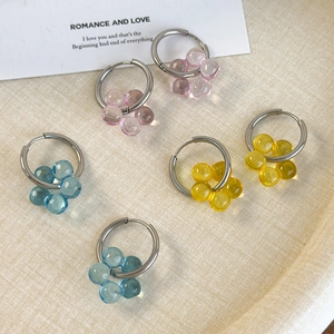 Floral hoop earrings set with colorful transparent flower charms and silver metal rings