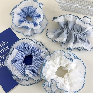 Blue plaid scrunchie set with lace trim and wavy edges for ponytail styling