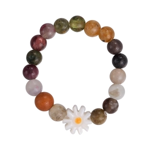 Handmade colorful beaded daisy ring featuring multi-color stones and a floral charm