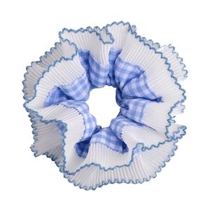 Close-up of blue plaid scrunchie with layered white pleated lace and blue stitched edges