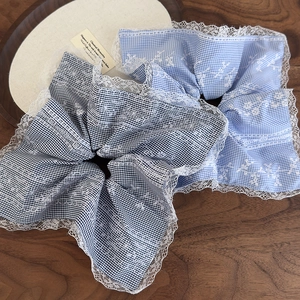Floral embroidered light blue and black plaid hair scrunchies with white lace trim